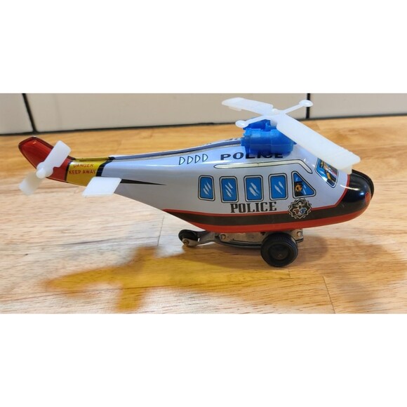 MTU Police Helicopter Wind Up Tin ToyKoreaWorks Sort Of-In Great Shape